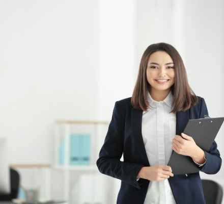 formal businesswoman with clipboard